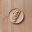 Tosta de hummus de frijoles blancos